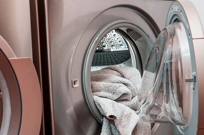 lavadora con toallas